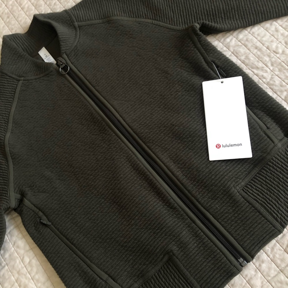 Never worn Lululemon hunter green bomber jacket